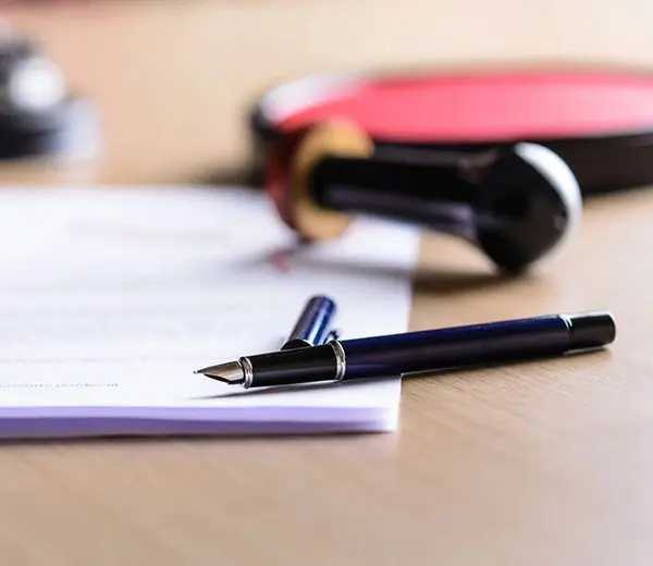 Contract Waiting for a Notary Public Sign on Desk